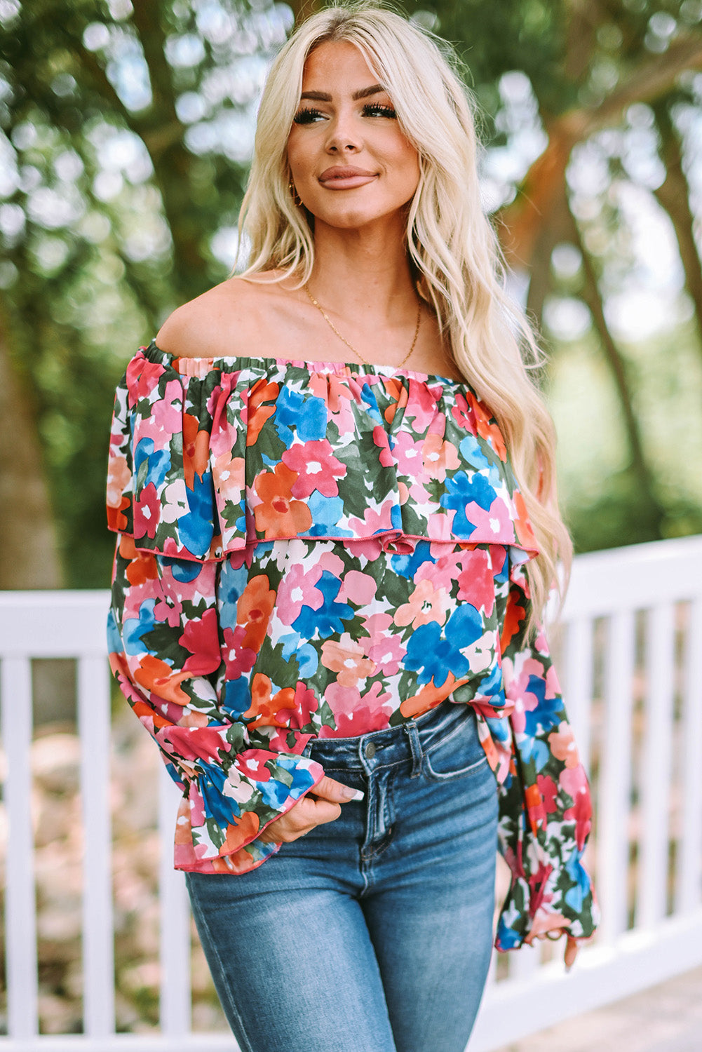 A stylish Floral Ruffled Off Shoulder Blouse featuring a vibrant floral print and elegant ruffles, perfect for various occasions.