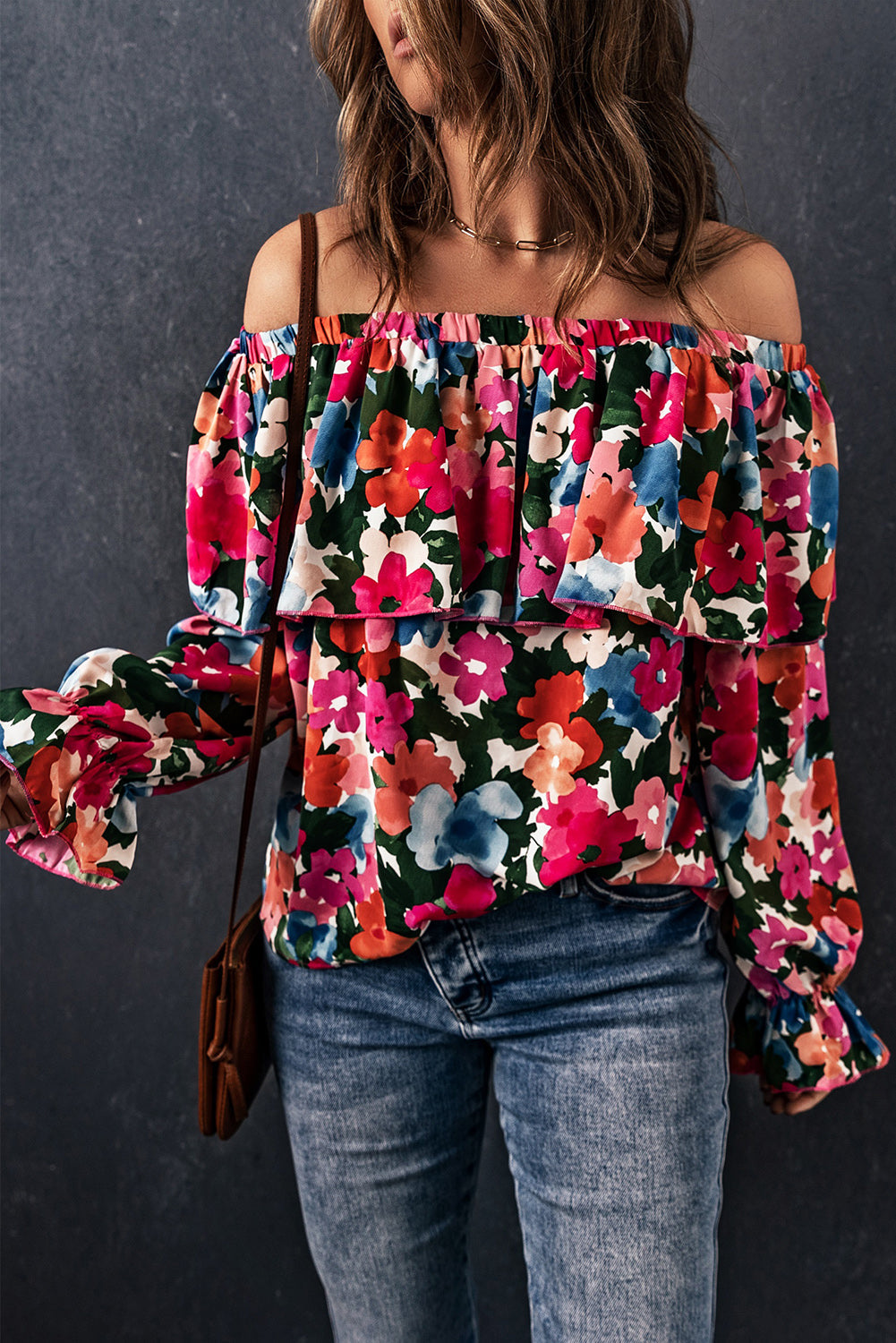 A stylish Floral Ruffled Off Shoulder Blouse featuring a vibrant floral print and elegant ruffles, perfect for various occasions.