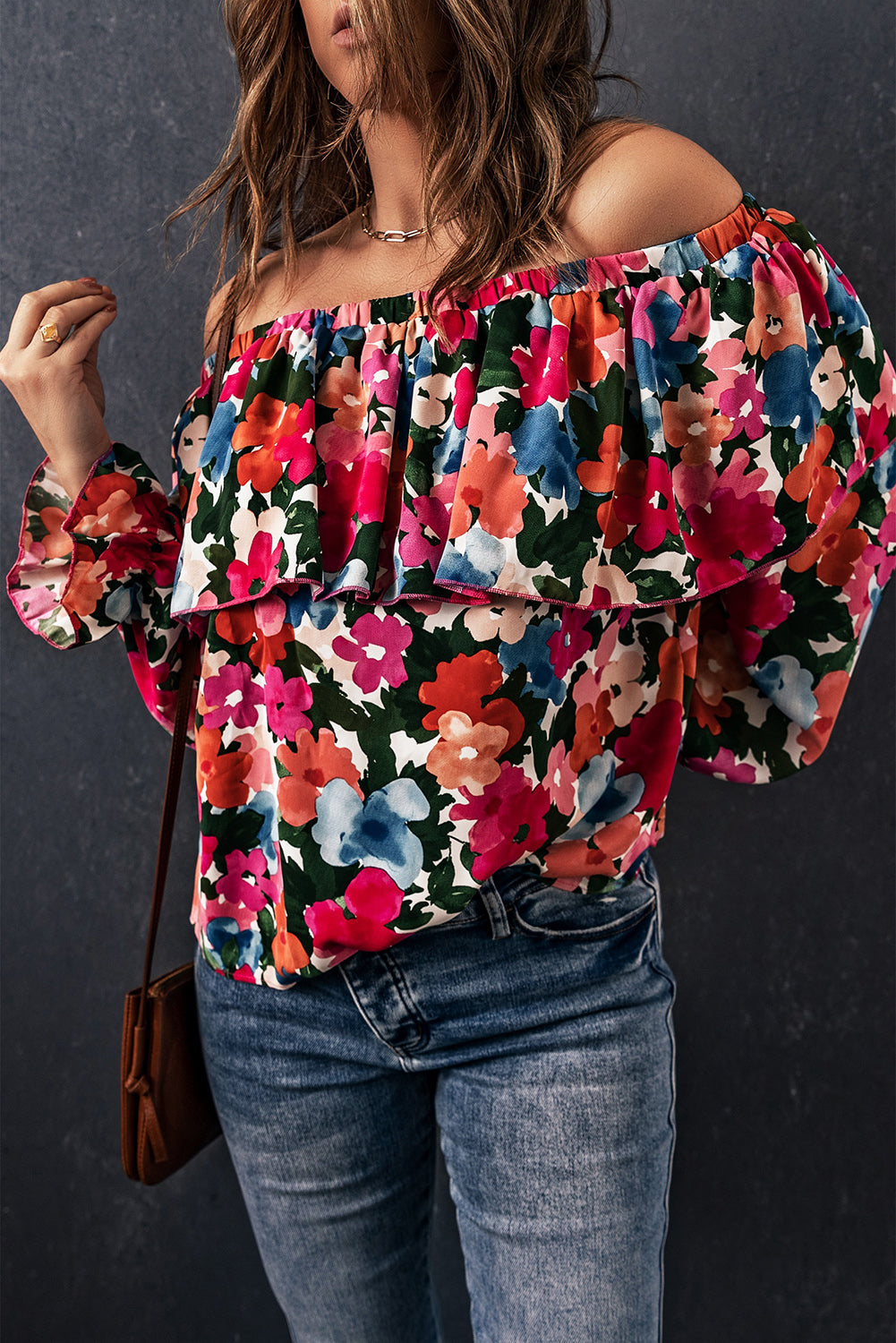 A stylish Floral Ruffled Off Shoulder Blouse featuring a vibrant floral print and elegant ruffles, perfect for various occasions.