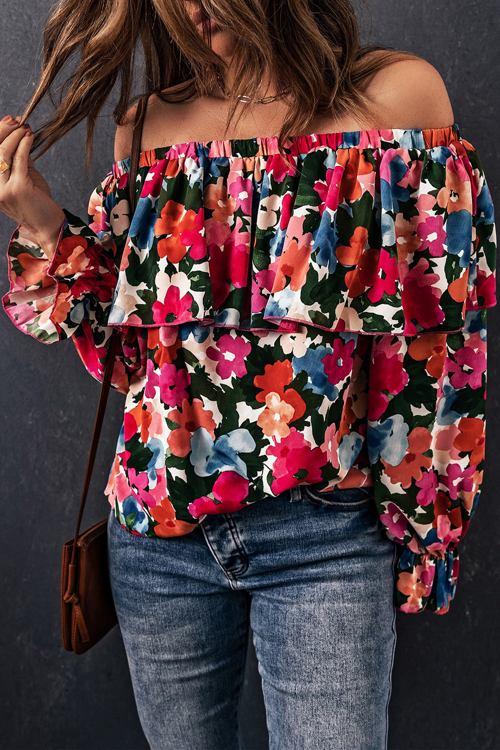 A stylish Floral Ruffled Off Shoulder Blouse featuring a vibrant floral print and elegant ruffles, perfect for various occasions.