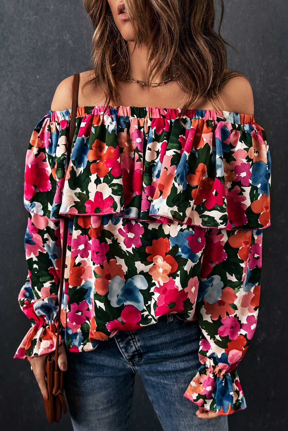 A stylish Floral Ruffled Off Shoulder Blouse featuring a vibrant floral print and elegant ruffles, perfect for various occasions.