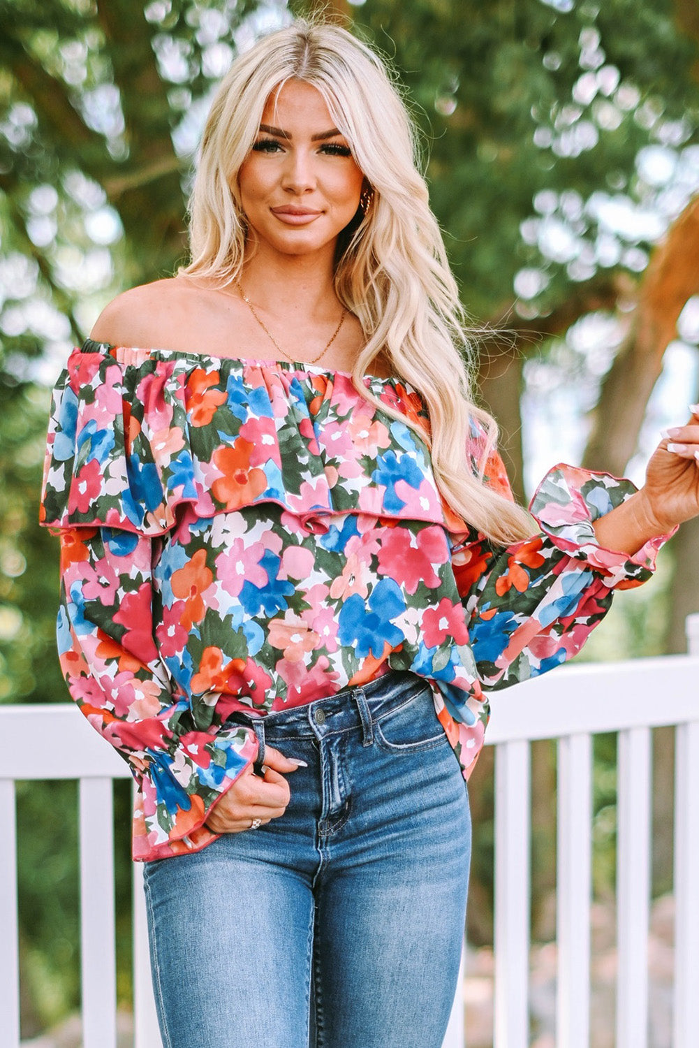 A stylish Floral Ruffled Off Shoulder Blouse featuring a vibrant floral print and elegant ruffles, perfect for various occasions.