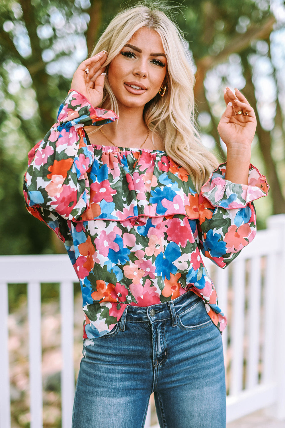 A stylish Floral Ruffled Off Shoulder Blouse featuring a vibrant floral print and elegant ruffles, perfect for various occasions.