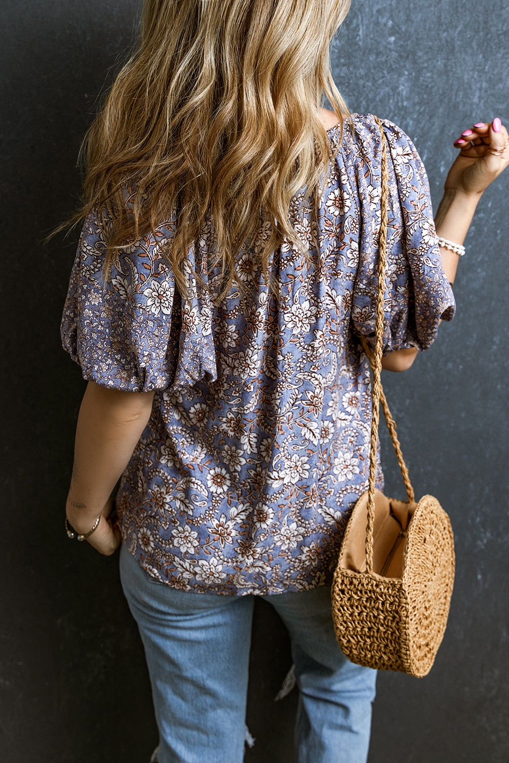 Floral Tassel Tie Split Neck Bubble Sleeve Blouse featuring a chic split V-neck, playful bubble sleeves, and a charming fringed tie detail.