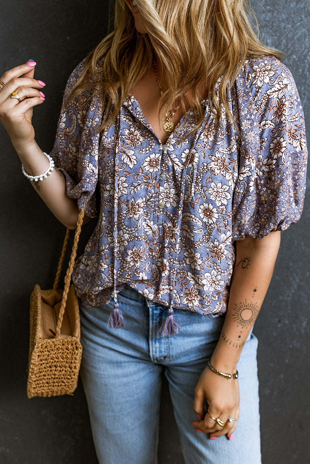 Floral Tassel Tie Split Neck Bubble Sleeve Blouse featuring a chic split V-neck, playful bubble sleeves, and a charming fringed tie detail.