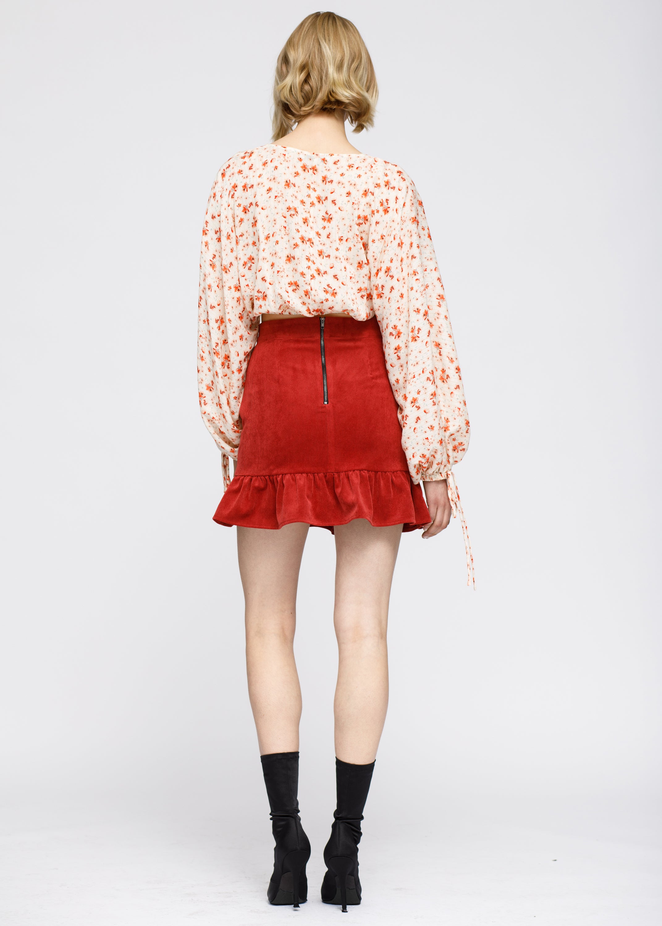 Floral Wrap Front Crop Blouse in Coral Gold featuring a vibrant floral pattern and stylish wrap design.