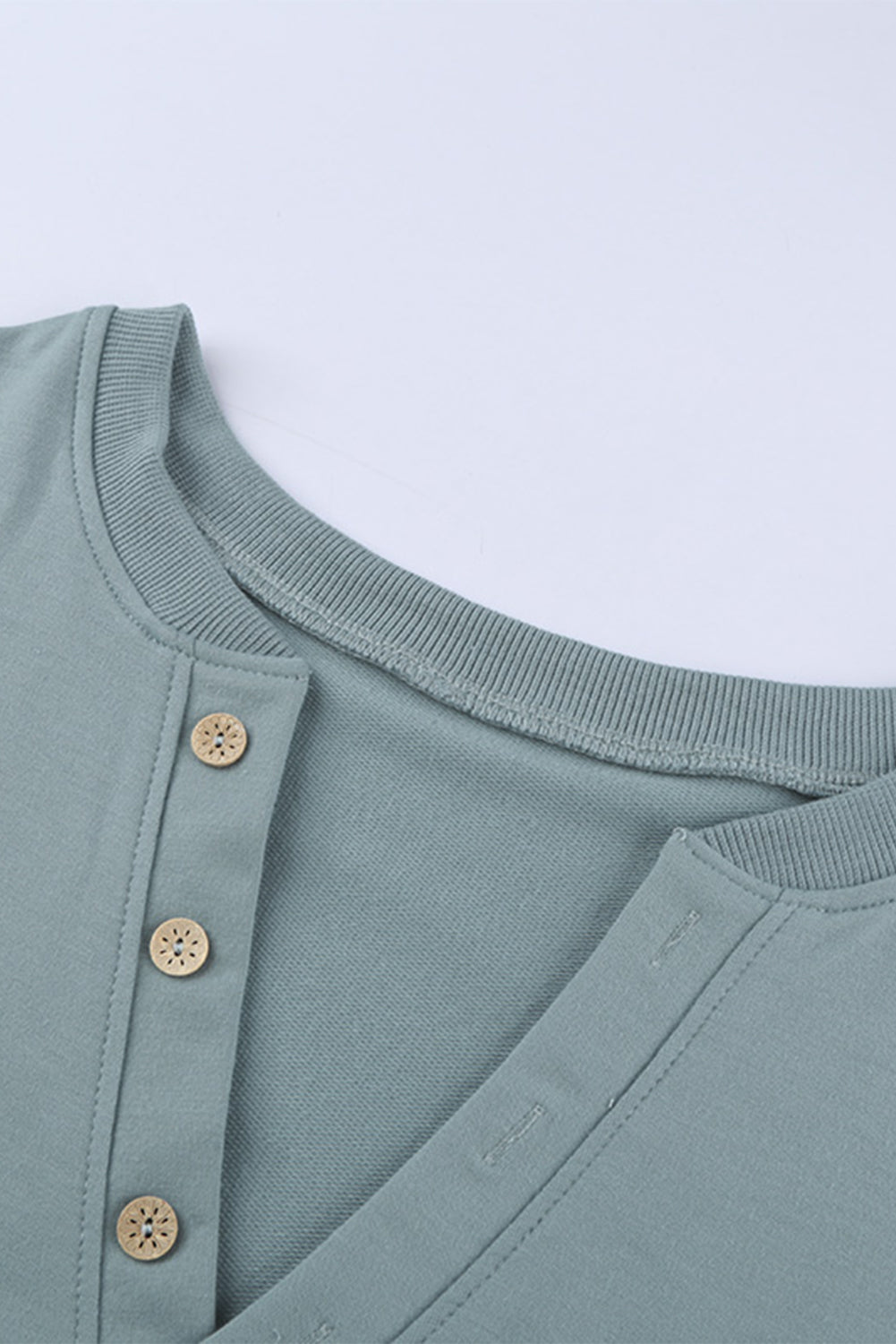 Green Buttoned V Neck Cotton Loose Fit Top featuring a stylish V-neckline, button-up design, and full sleeves, perfect for casual wear.