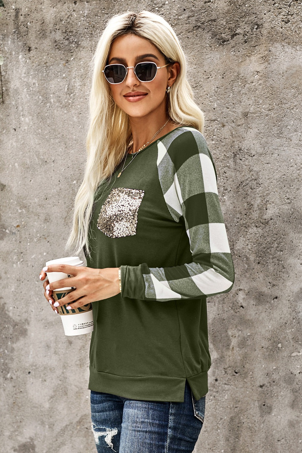 Green plaid long sleeve top with sequined pocket detail, showcasing a stylish and casual design.