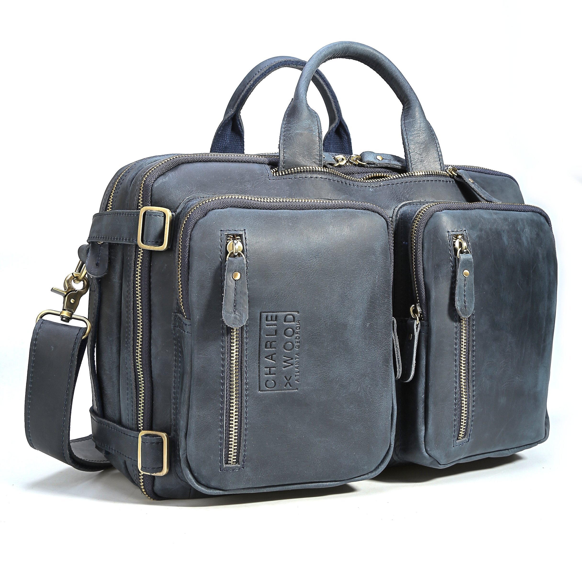 Hartwell leather bag in blue, showcasing its classic design and versatility as a backpack, briefcase, or messenger bag.