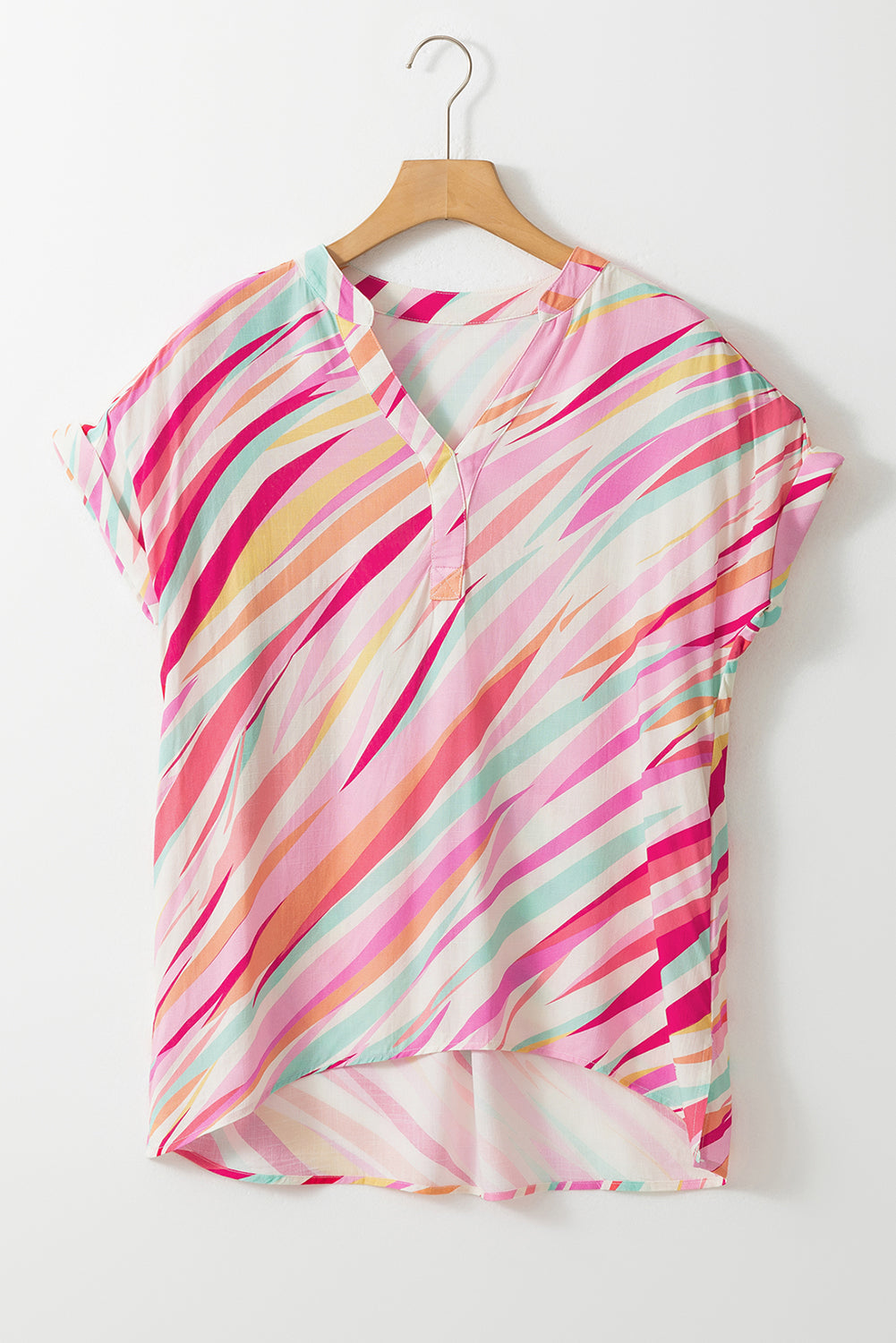 High Low Short Sleeve Blouse featuring abstract prints and a chic design, perfect for casual and office wear.