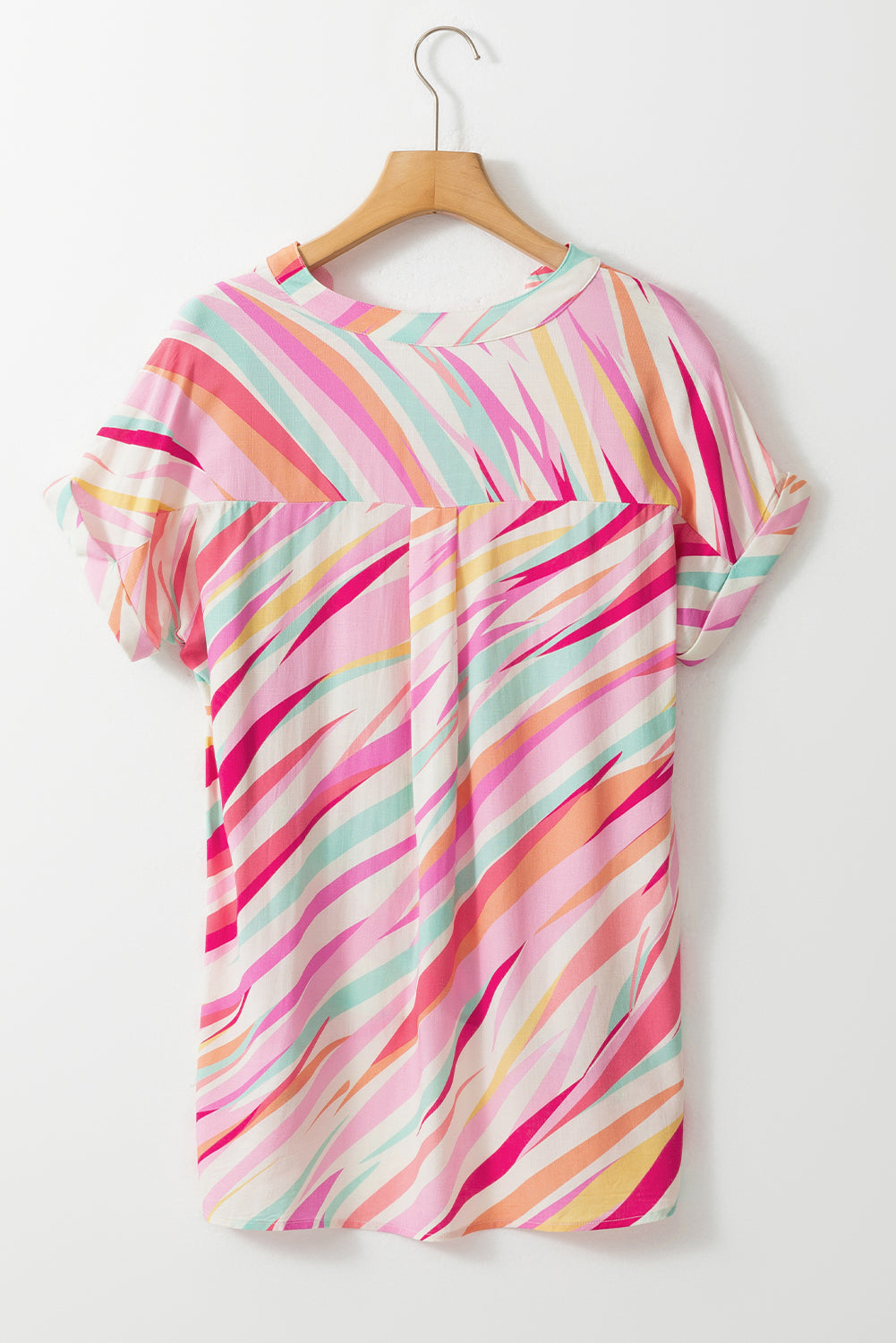 High Low Short Sleeve Blouse featuring abstract prints and a chic design, perfect for casual and office wear.