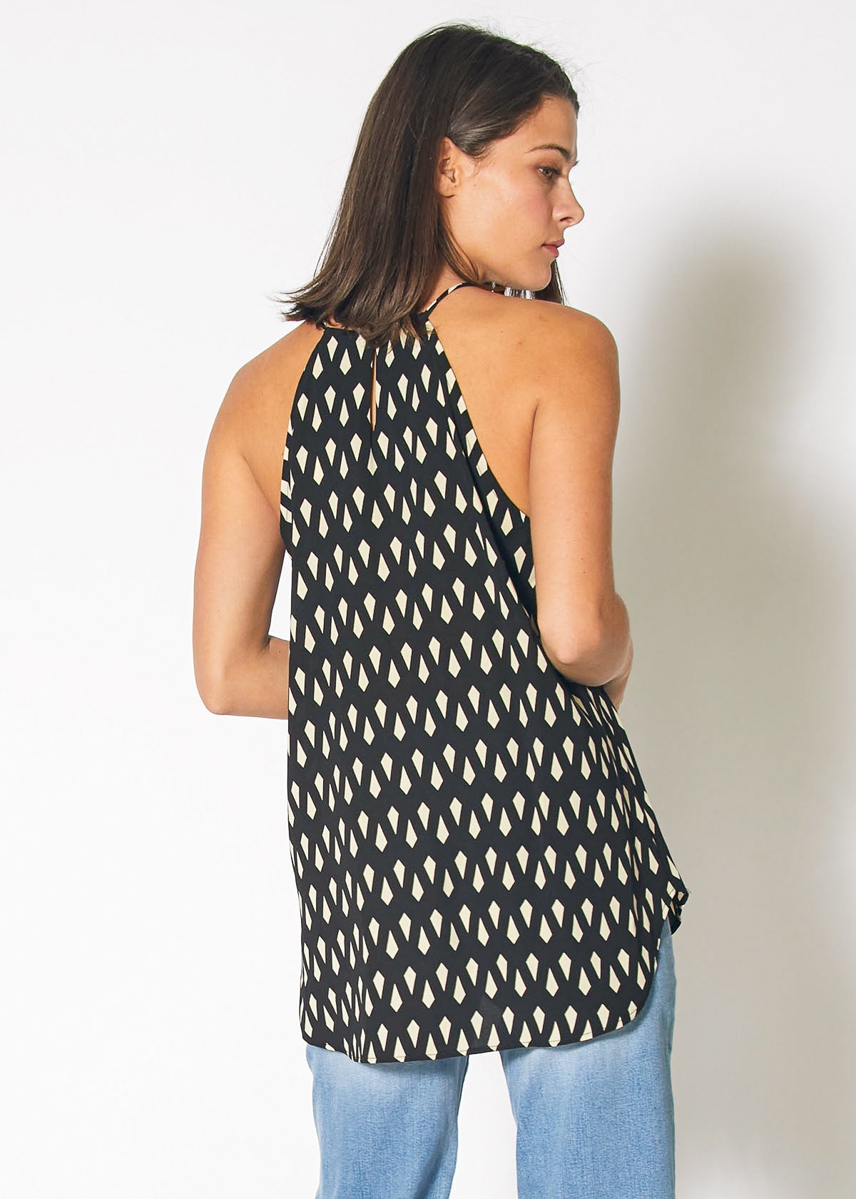 Keyhole Halter Print Sleeveless Top in Black Geo featuring a stylish geometric pattern and halter neckline.