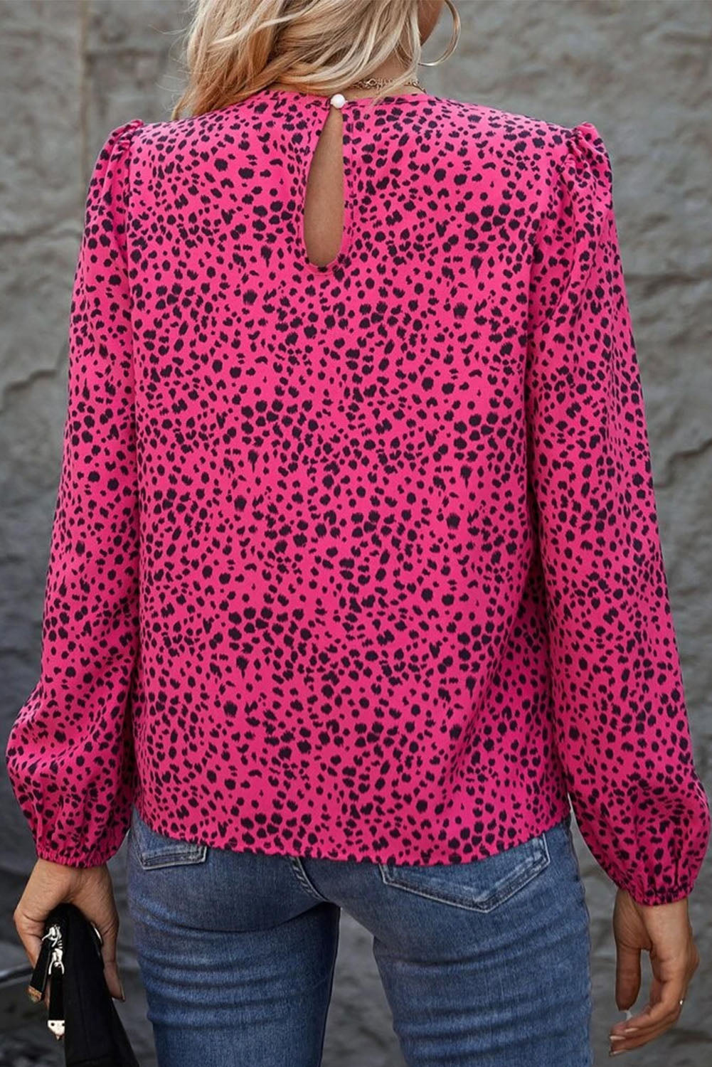 Leopard Print Pleated Blouse with Keyhole detail, featuring puff sleeves and a stylish design.