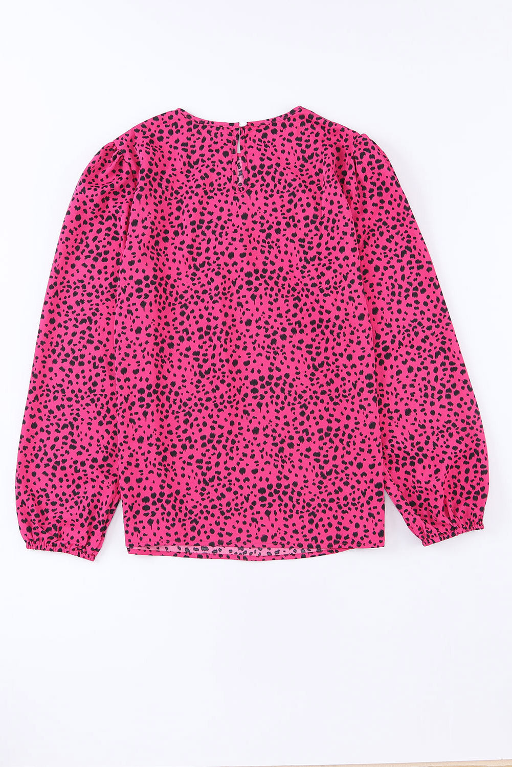 Leopard Print Pleated Blouse with Keyhole detail, featuring puff sleeves and a stylish design.