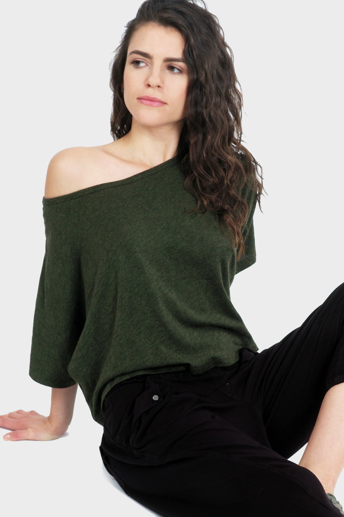 LUMI Organic Crop Top featuring a textured slouchy silhouette and bateau neck, made from organic cotton and bamboo rayon.