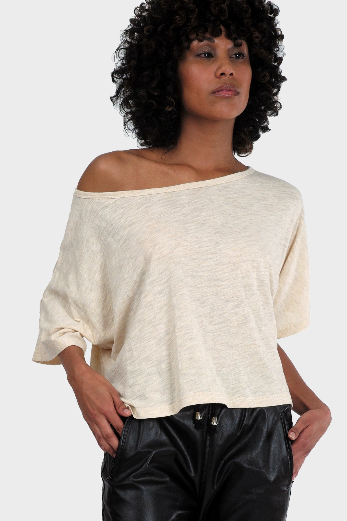 LUMI Organic Crop Top featuring a textured fabric, slouchy silhouette, and bateau neck, perfect for casual summer wear.