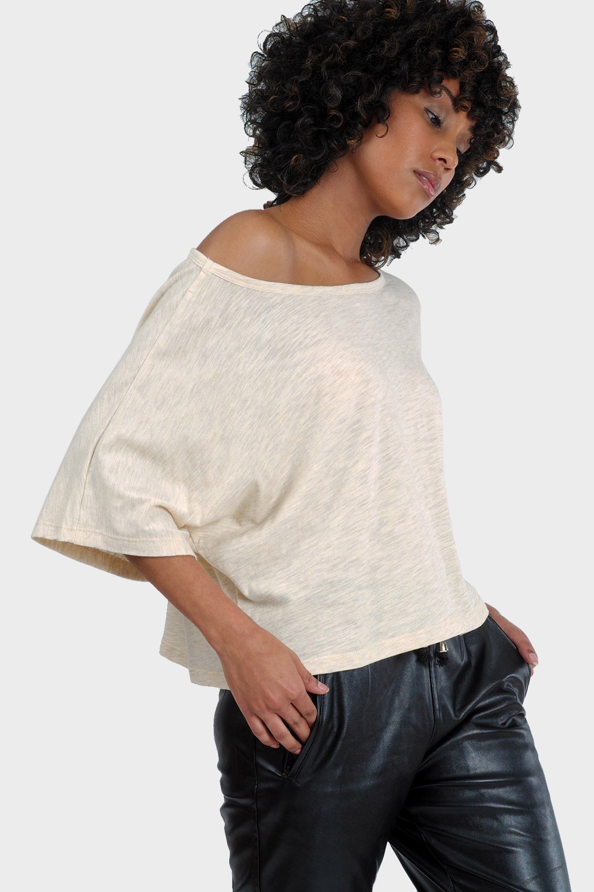 LUMI Organic Crop Top featuring a textured fabric, slouchy silhouette, and bateau neck, perfect for casual summer wear.