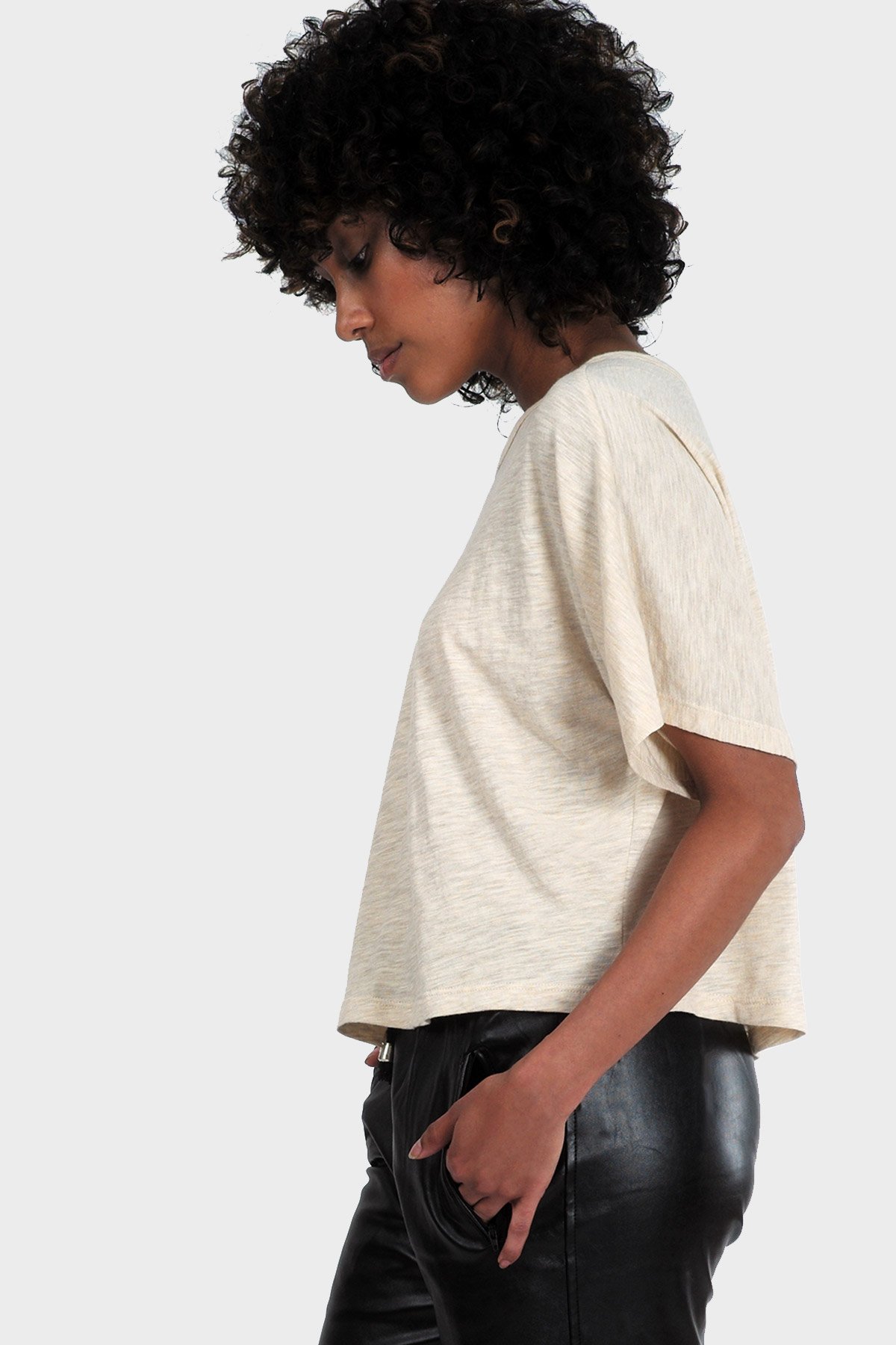 LUMI Organic Crop Top featuring a textured fabric, slouchy silhouette, and bateau neck, perfect for casual summer wear.