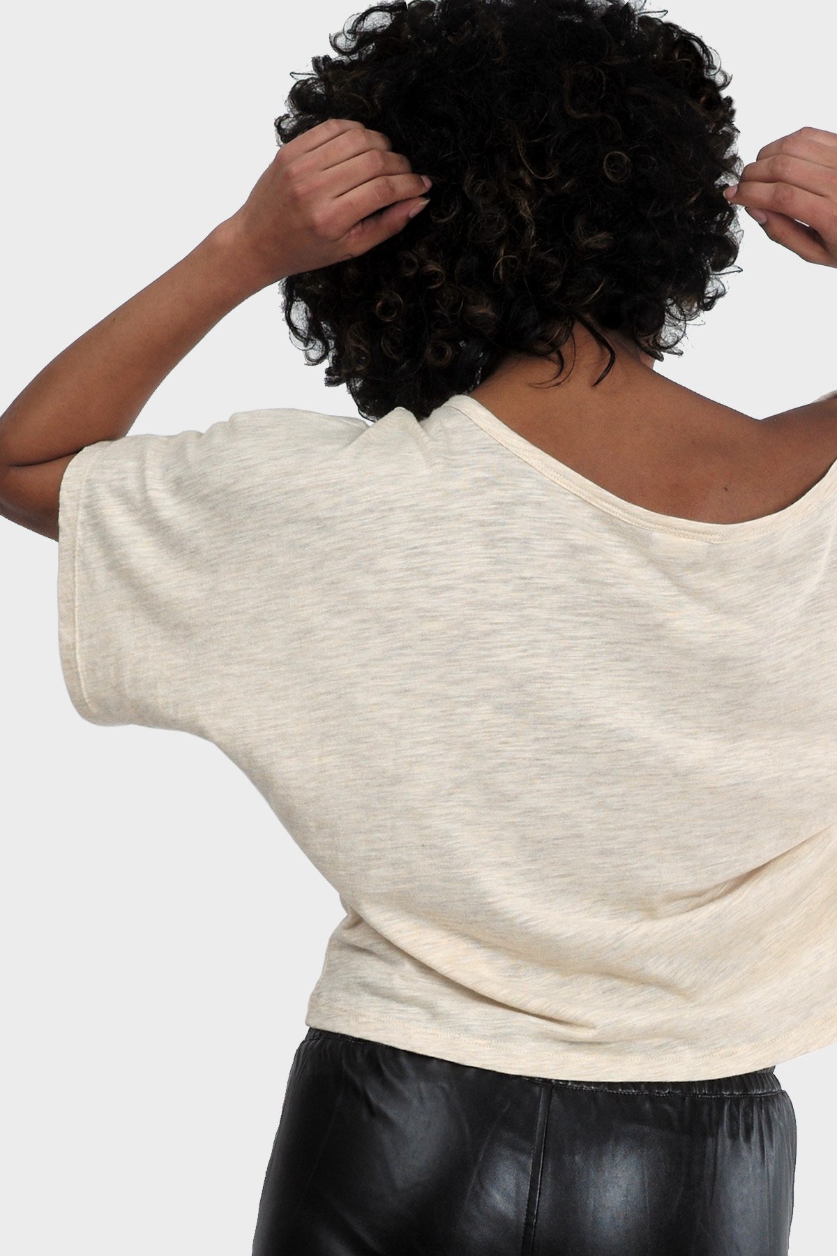 LUMI Organic Crop Top featuring a textured fabric, slouchy silhouette, and bateau neck, perfect for casual summer wear.