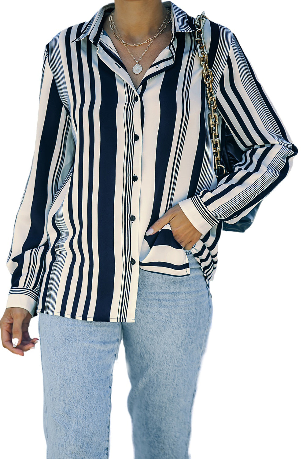 A stylish navy striped modern women's shirt featuring long sleeves and a tunic length, perfect for work or casual outings.