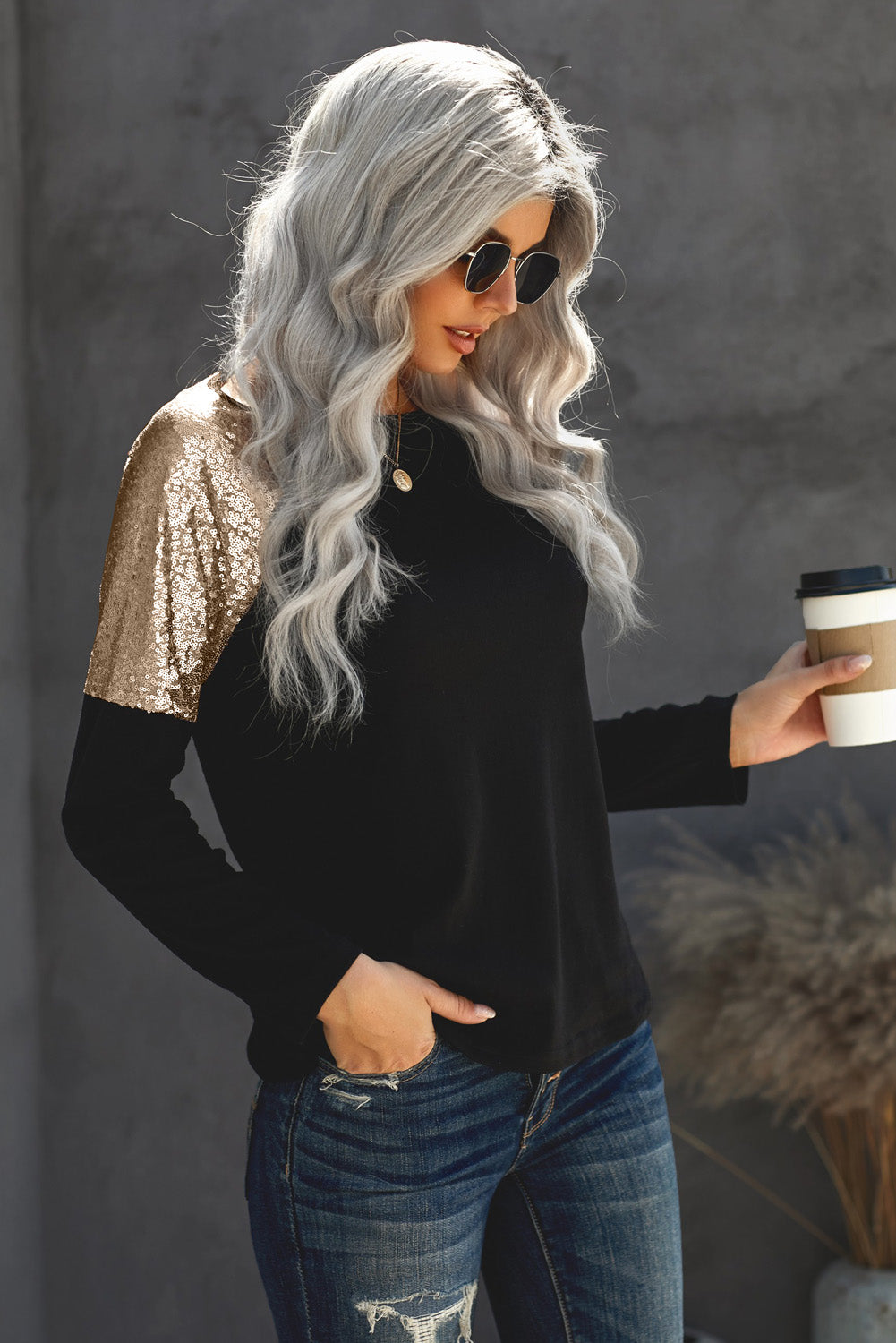 New Black Sequin Shoulder Long Sleeve Top featuring a classic round neck and stylish sequin accents on the shoulders, made from soft knit fabric.