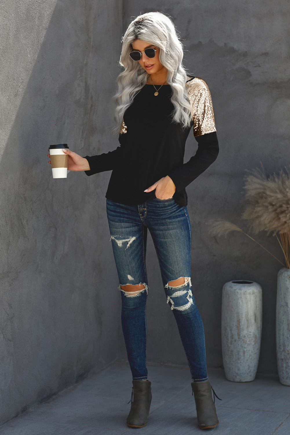 New Black Sequin Shoulder Long Sleeve Top featuring a classic round neck and stylish sequin accents on the shoulders, made from soft knit fabric.