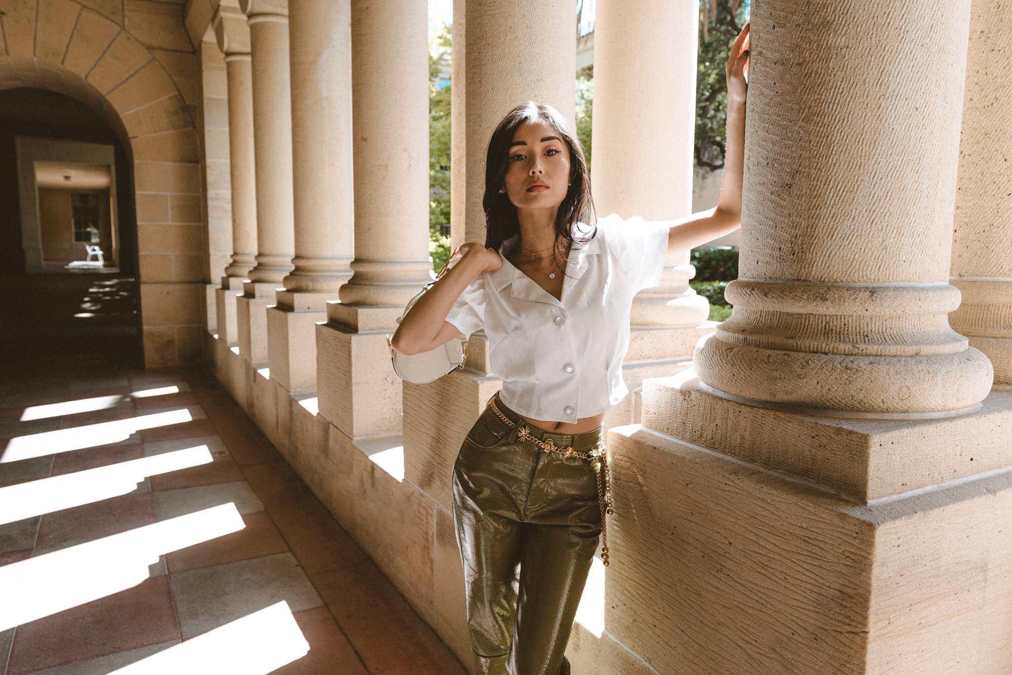 Peyton Puffed Sleeve Button-Down Blouse featuring puffed sleeves and moonstone-like buttons, styled on a mannequin.