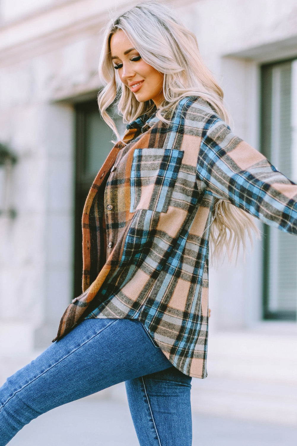 A stylish plaid color block buttoned shirt featuring functional pockets, perfect for fall fashion.