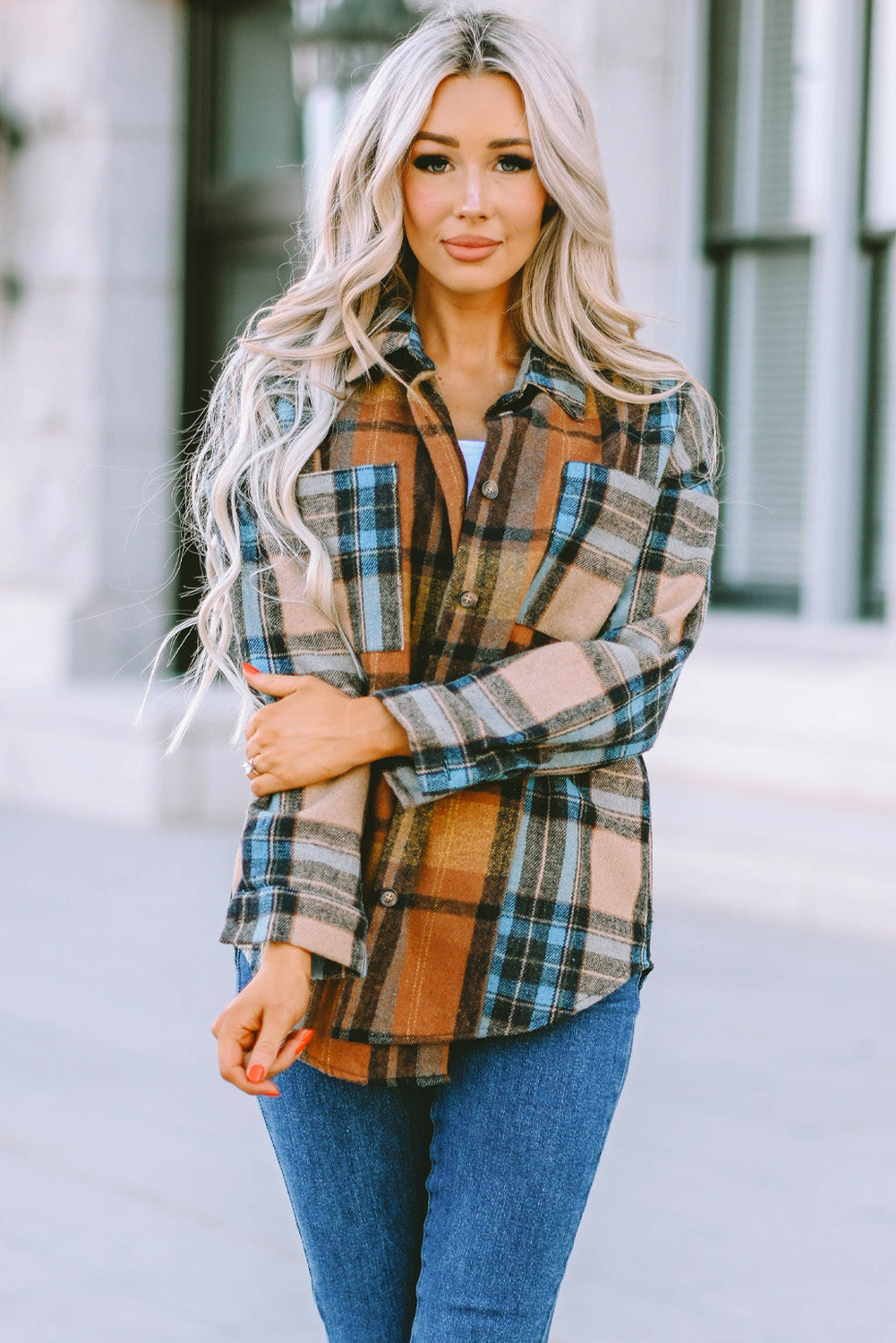 A stylish plaid color block buttoned shirt featuring functional pockets, perfect for fall fashion.