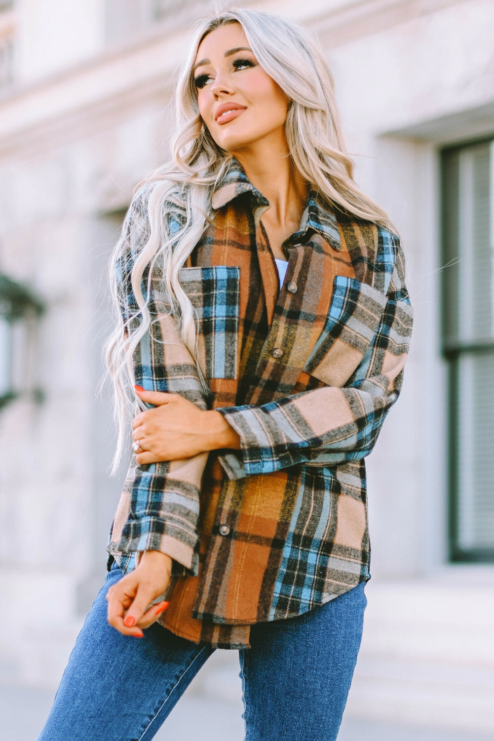 A stylish plaid color block buttoned shirt featuring functional pockets, perfect for fall fashion.