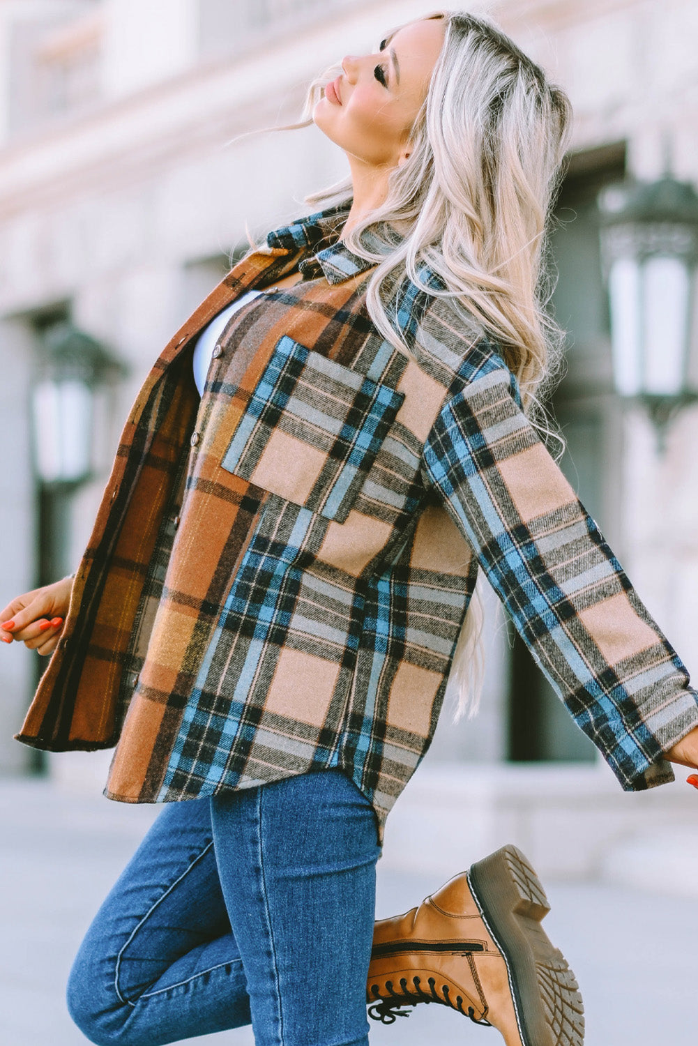 A stylish plaid color block buttoned shirt featuring functional pockets, perfect for fall fashion.