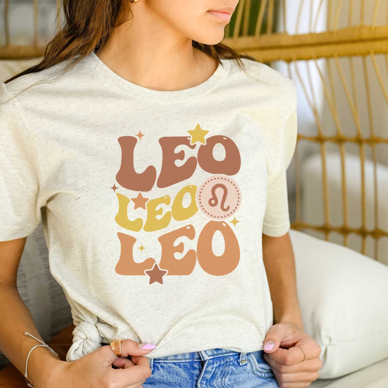 A soft tri-blend Retro Leo Graphic Tee featuring a vintage-inspired design, perfect for casual wear.