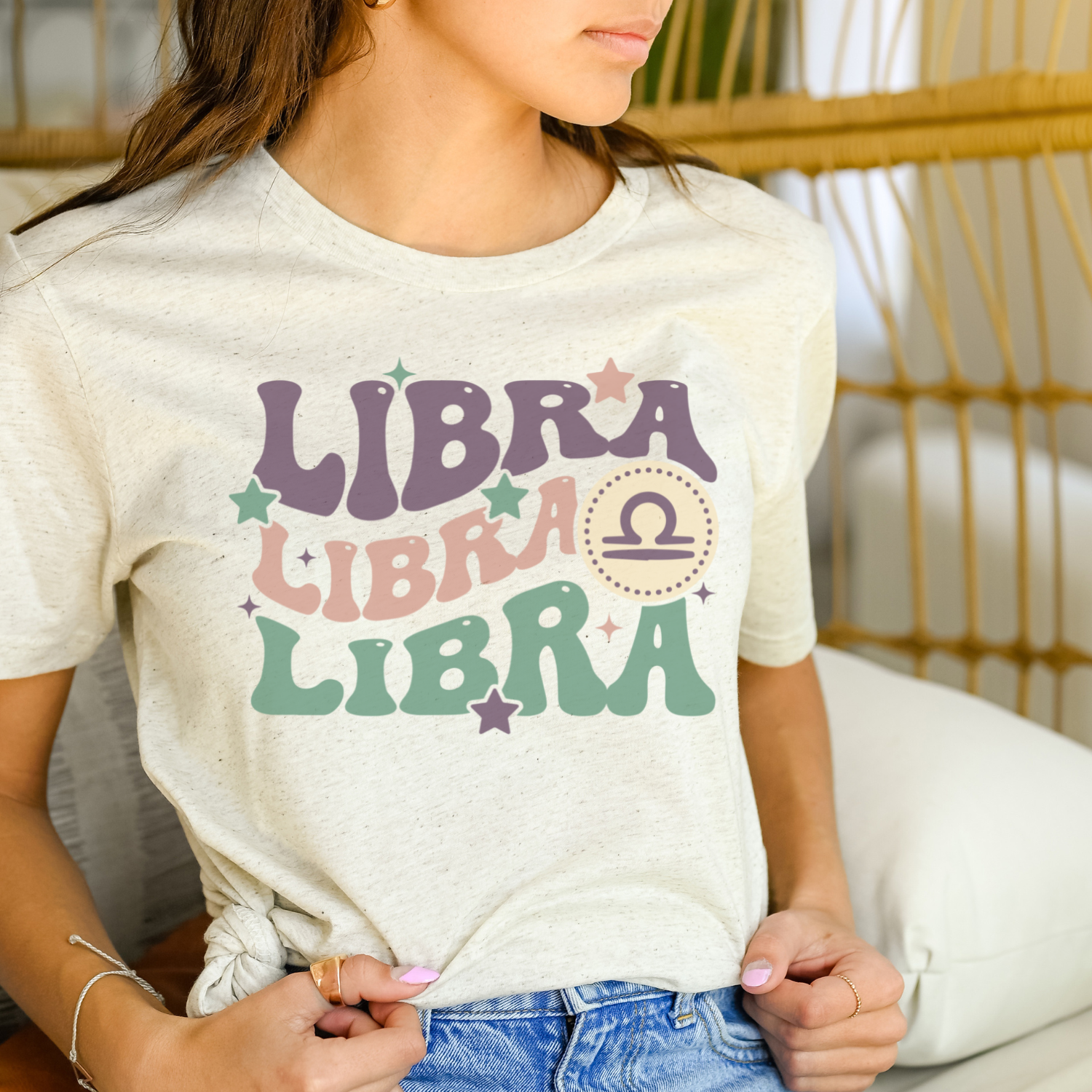 A soft tri-blend Retro Libra Graphic Tee featuring a vintage Libra design, perfect for casual wear.