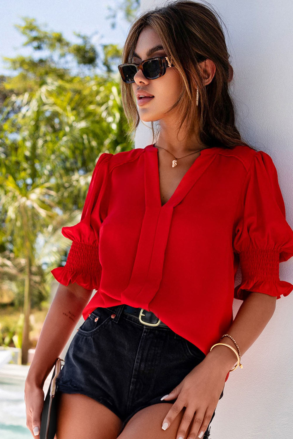 Solid Color Half Sleeve V Neck Blouse in various colors, showcasing its elegant design and comfortable fit.