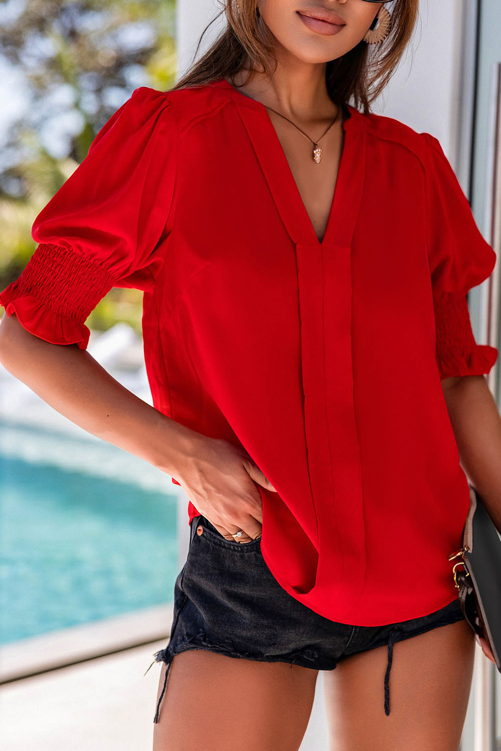 Solid Color Half Sleeve V Neck Blouse in various colors, showcasing its elegant design and comfortable fit.