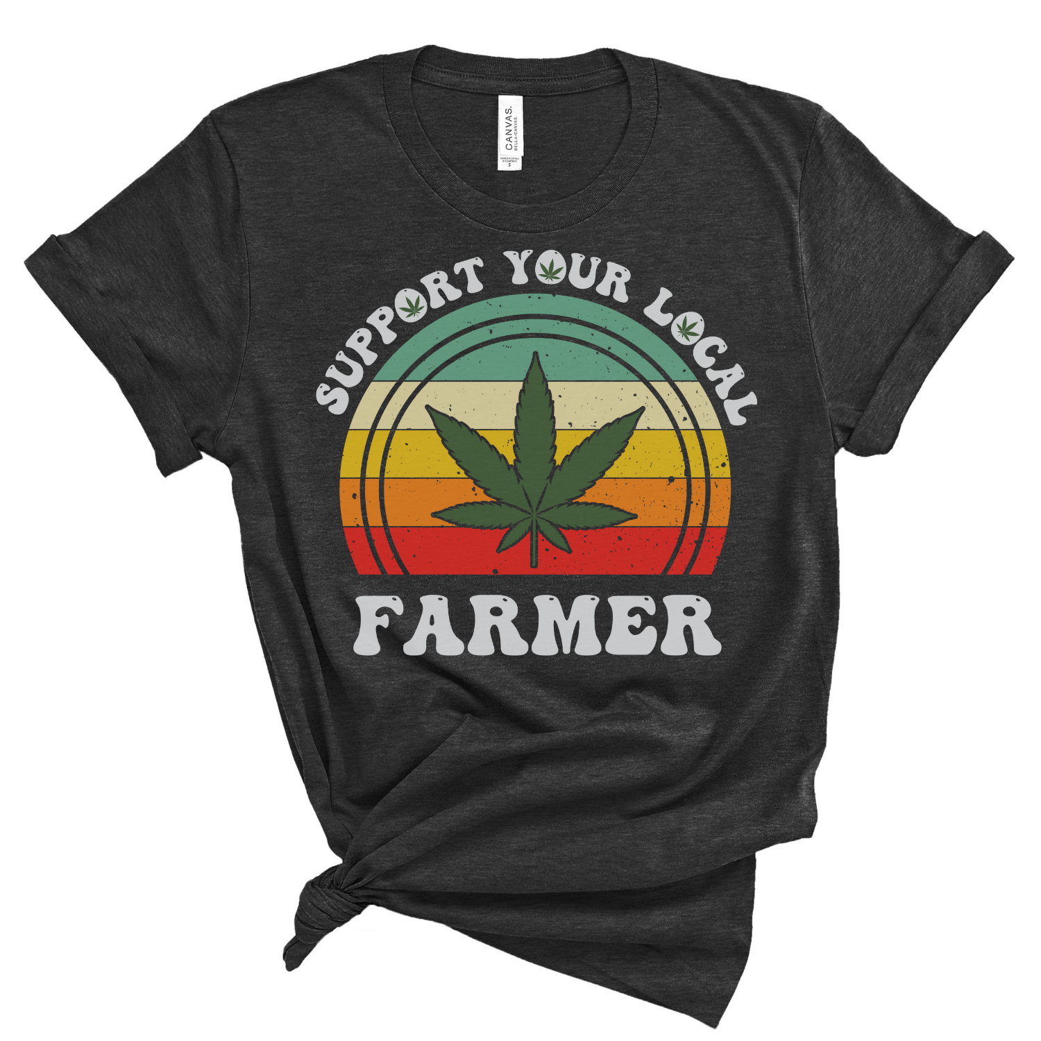 A soft graphic tee featuring the phrase 'Support Your Local Farmer' in bold letters, made from 100% ring spun cotton.