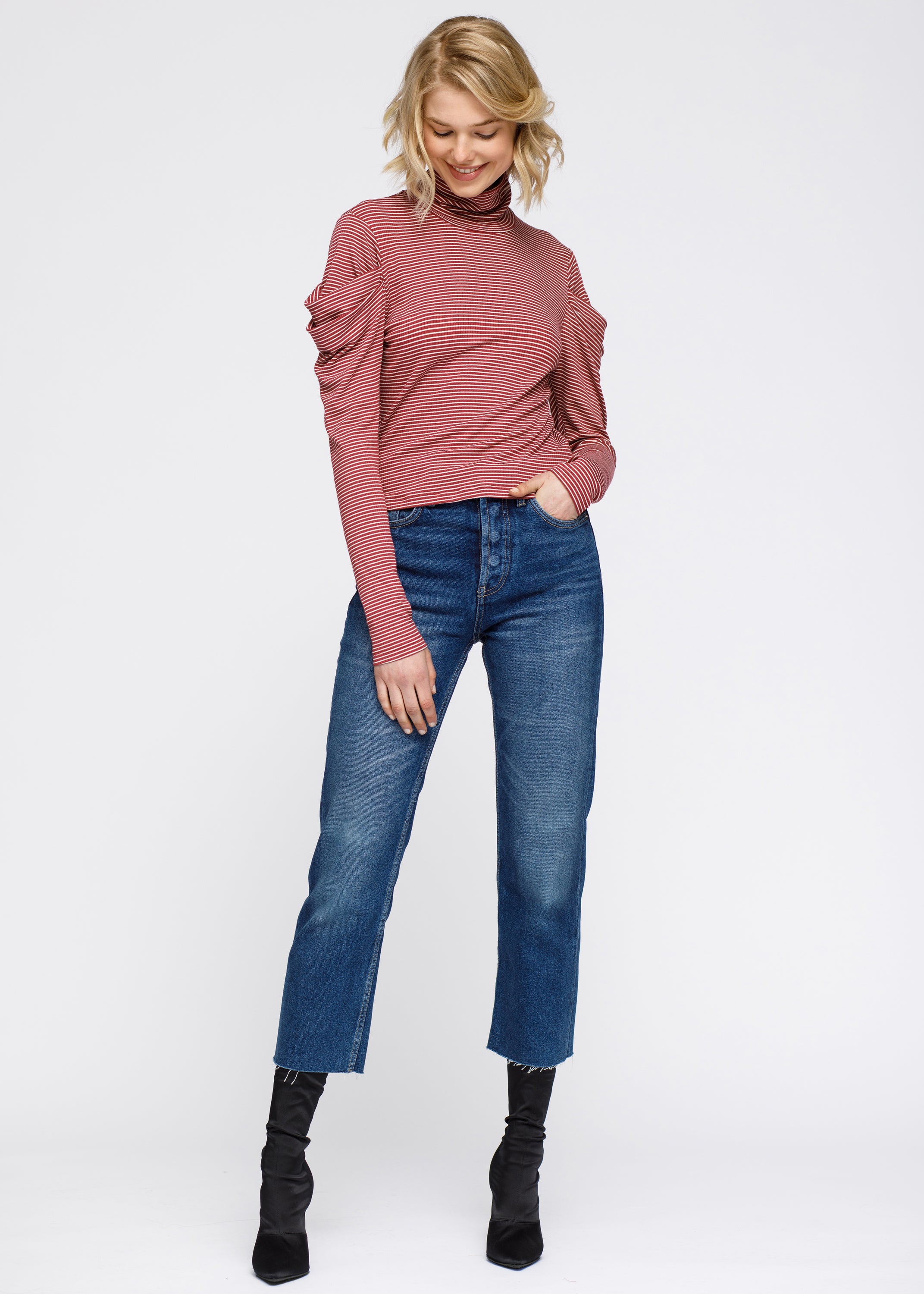 A stylish Turtle Neck Puff Sleeve Stripe Knit Top featuring a ribbed knit design, gathered puff sleeves, and a chic turtle neck.