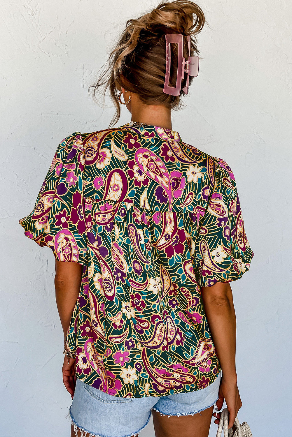 A stylish V Neck Short Bubble Sleeve Paisley Blouse featuring a vibrant paisley print, short bubble sleeves, and a loose fit, perfect for casual or formal wear.