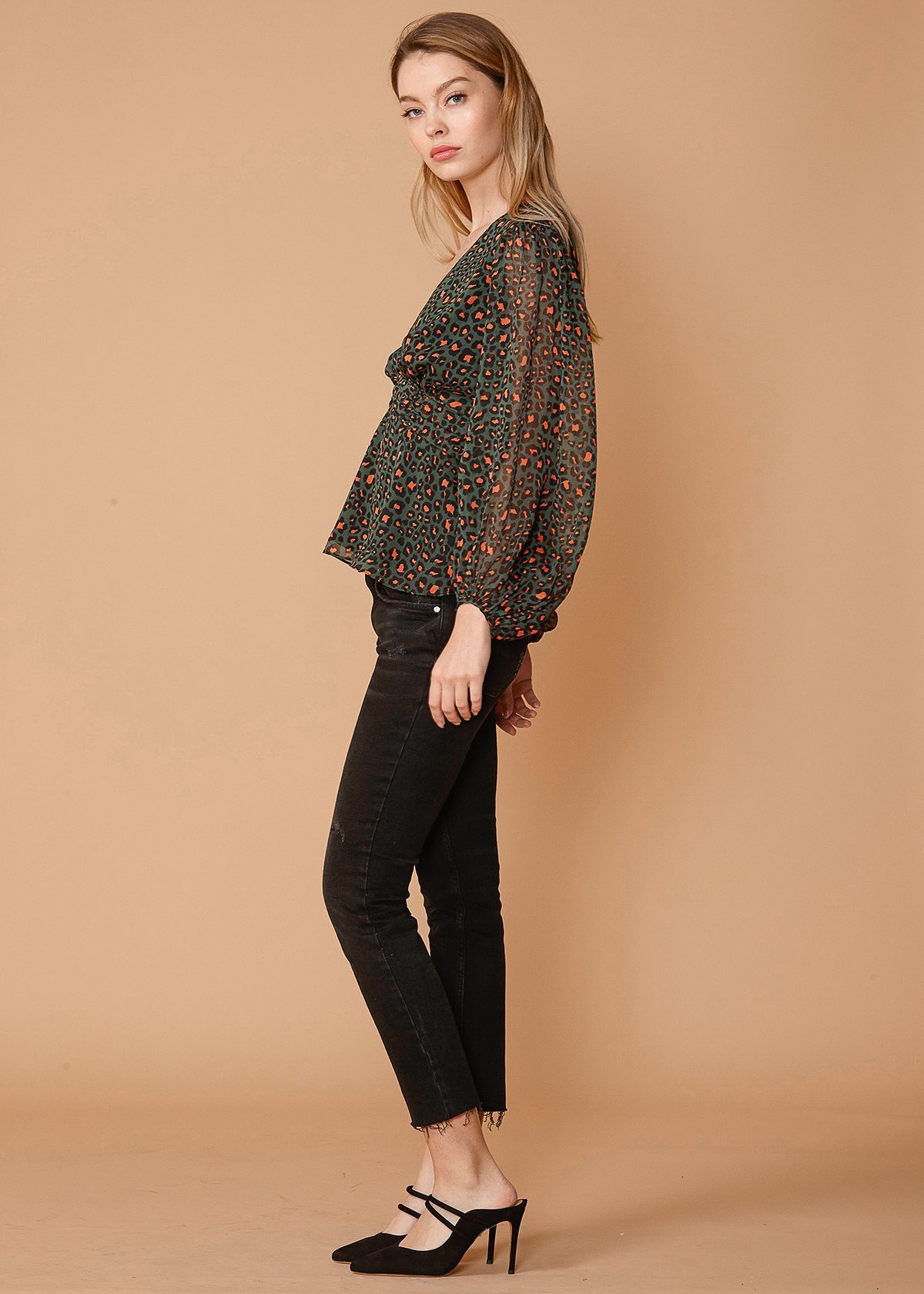 V-neck Puff Sleeve Blouse in Leopard Hunt featuring a stylish leopard print and smocked waist design.