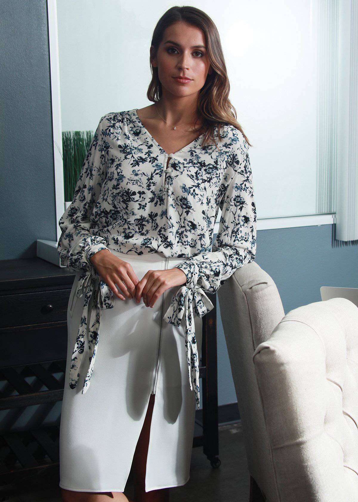 V-neck Tie Cuff Blouse in Ivory Floral Garden featuring floral print, long sleeves with tie cuffs, and button-up front.