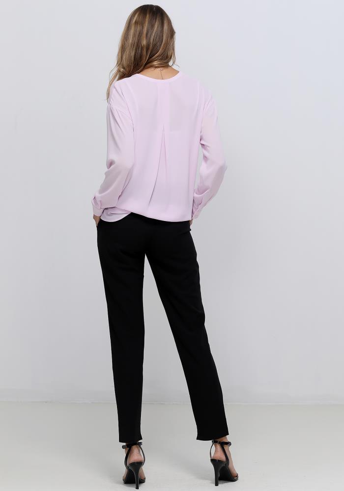 A stylish V-Neck Wrap Hem Blouse featuring a pleated front and hi-lo design, with long sleeves and single button cuffs, made from 100% polyester.