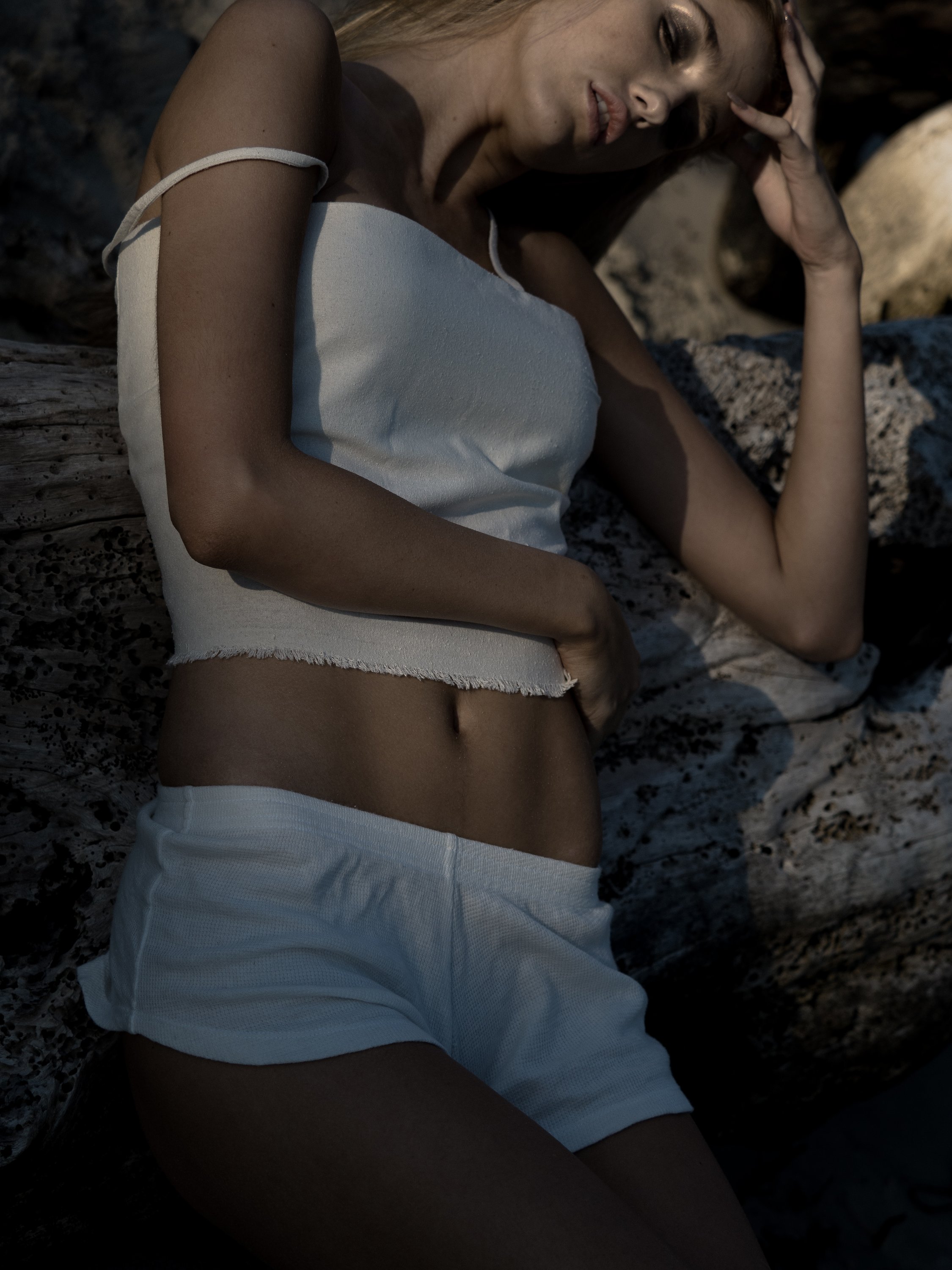 A cropped singlet top made from 100% raw wild silk, featuring a raw edge design, perfect for summer wear.