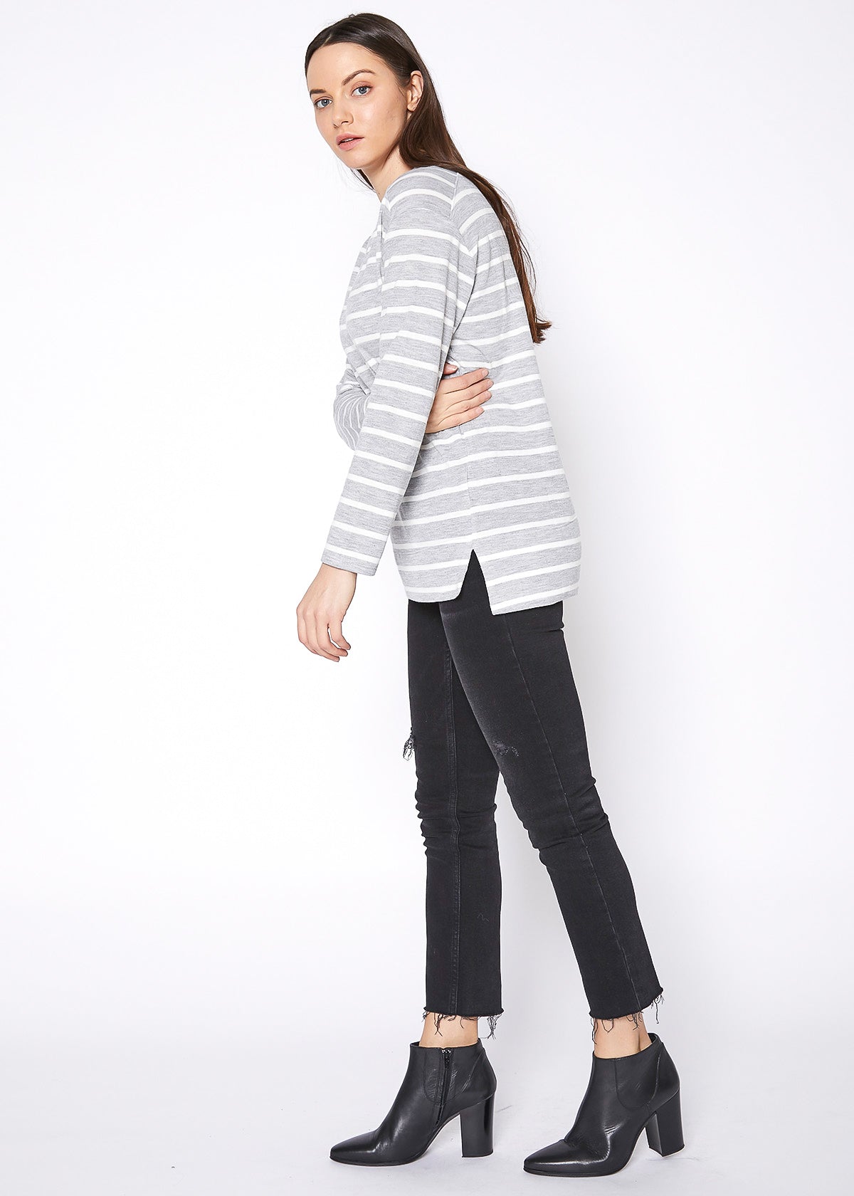 Women's Basic Crewneck Hi Lo Knit Top in soft cotton-polyester blend, featuring a stylish hi-lo design and long sleeves.