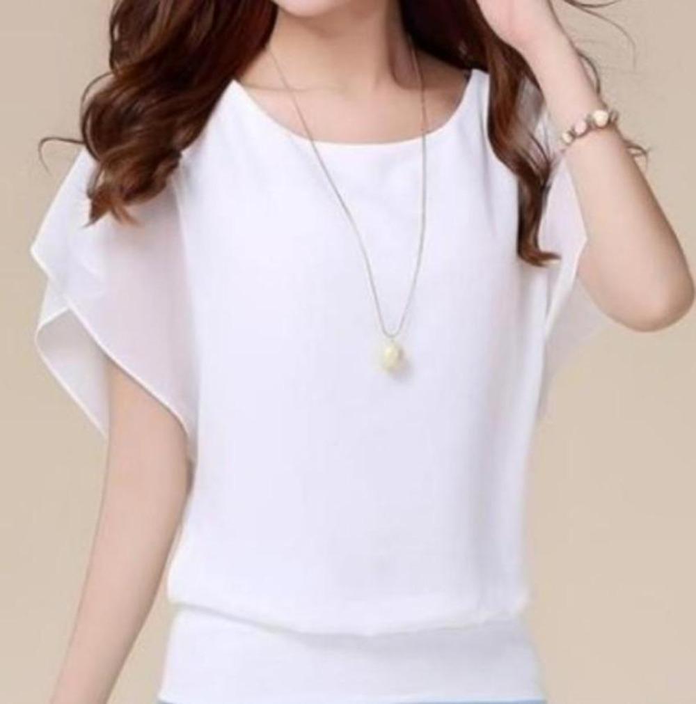 White blouse with necklace.