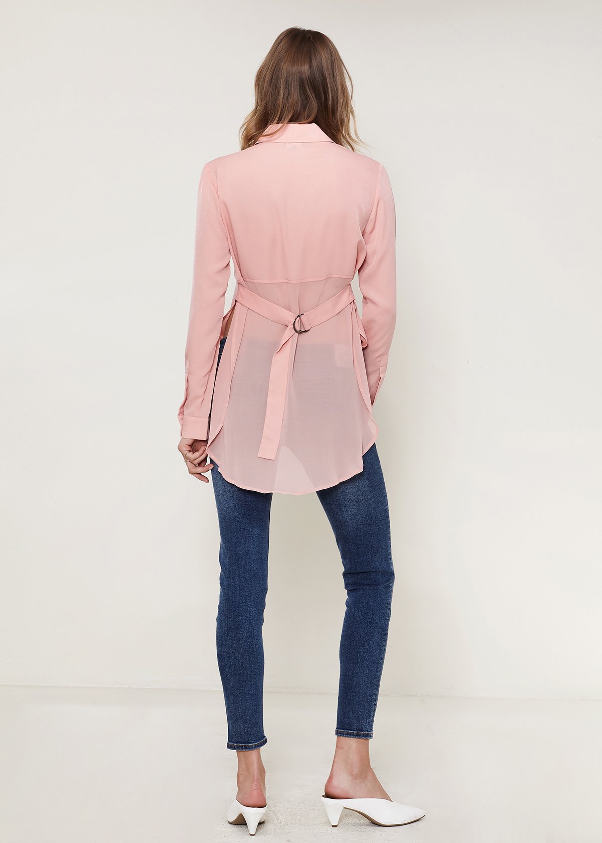 Women's Belted Hi-lo Blouse in Peach Apricot featuring long sleeves, a hi-lo hem, and a belted back detail.