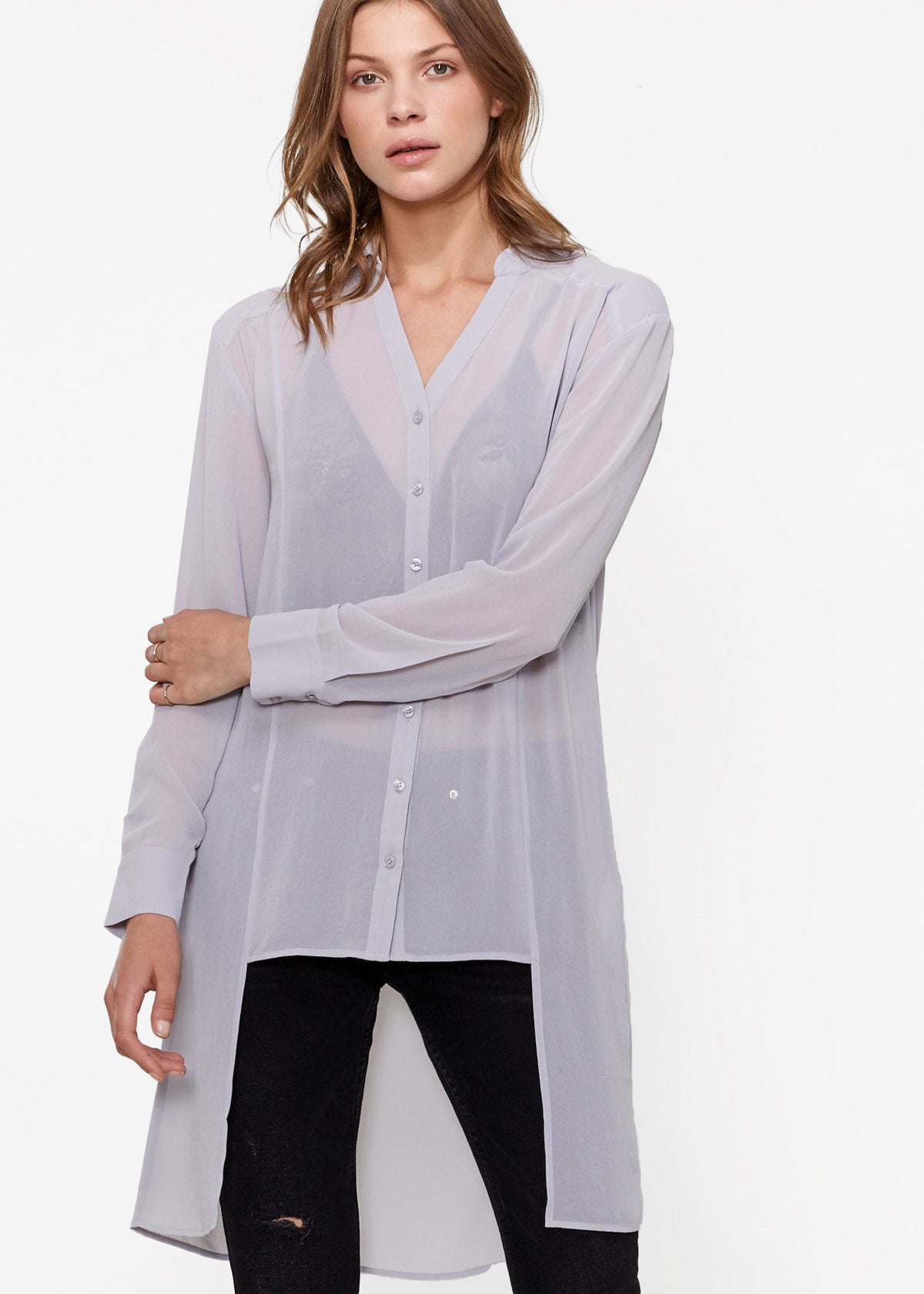 Women's Casual Sheer Hi-Lo Blouse featuring O-ring accent and hi-lo hem design, made from 100% polyester.