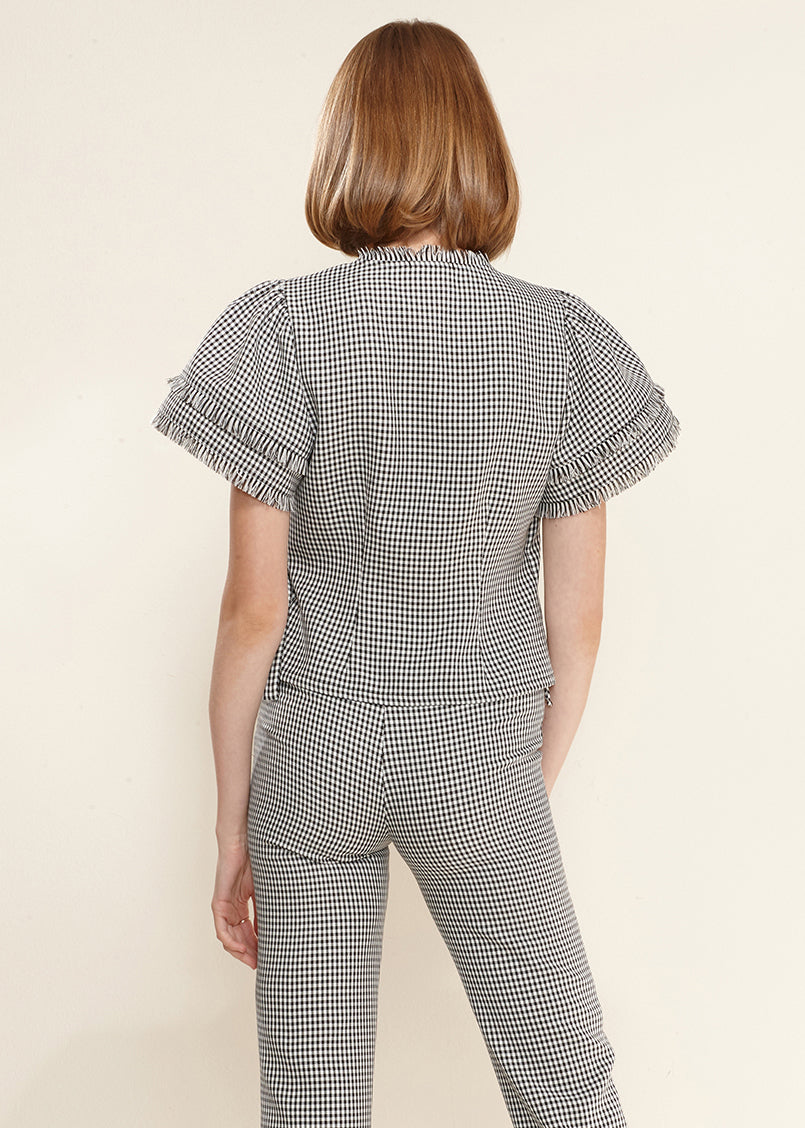 Women's Fringe Trim Gingham Wrap Blouse featuring a stylish side tie and fringe detailing in a classic gingham pattern.