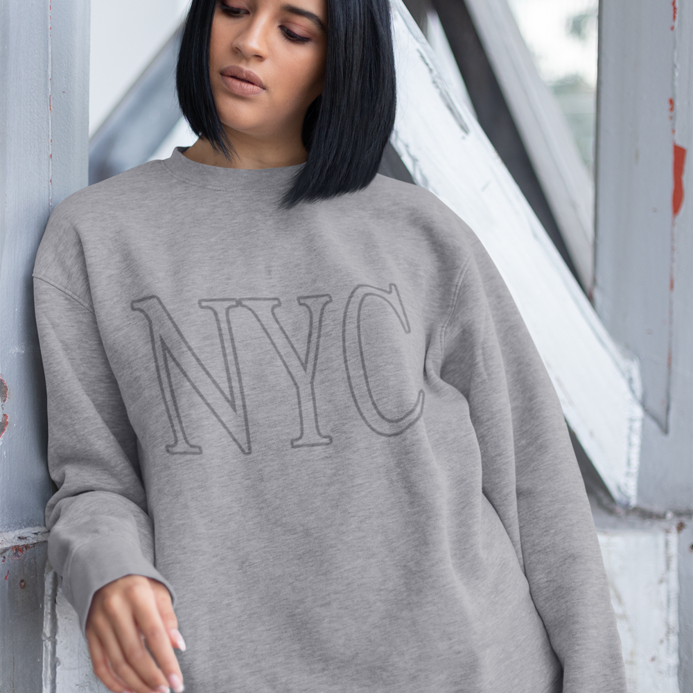 Womens Gray NYC Crewneck Sweatshirt featuring a loose fit and stylish logo design, perfect for casual wear.