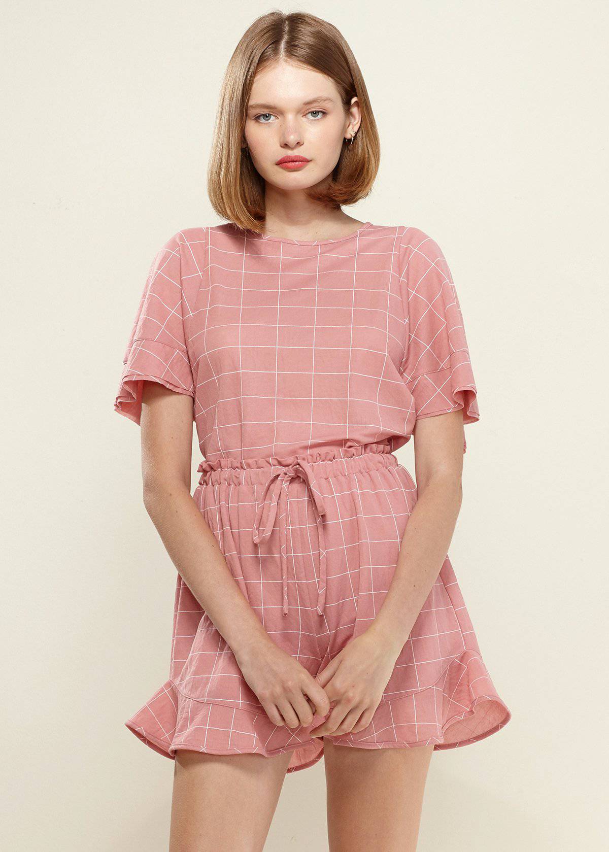 Women's Grid Print Blouse in soft pink with butterfly sleeves and round neckline, featuring a stylish grid pattern.