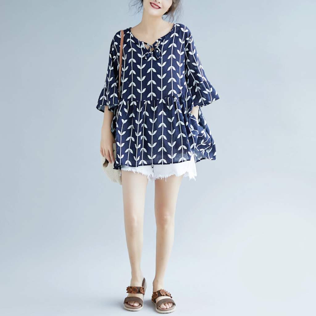 Womens Linen Floral Top in navy color with floral design, showcasing a loose fit and comfortable fabric.